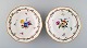 Two antique 
Meissen deep 
plates in 
pierced 
porcelain ...