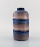 Ilse Claesson for Rörstrand. Rare glazed ceramic vase with striped design. 
1920/30