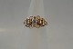 Guldring med 
Zirkon, 14 
Karat
Stemplet: 585, 
SCF
Guldsmed: 
1947-1973	S. 
Chr. ...