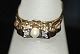 Gold ring with 
Pearl and 
Diamonds 14 
Carat
Size 63