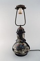 Møller & Bøgely, Denmark. Large art nouveay table lamp in glazed ceramics. Dated 
1917-20.
