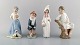 Lladro, Tengra 
og Zaphir, 
Spanien. Fire 
porcelænsfigurer 
af børn. 
1980/90'erne. 
Største måler: 
...