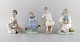 Lladro og Nao, 
Spanien. Fire 
porcelænsfigurer 
af børn. 
1980/90'erne. 
Største måler: 
20,5 x 16 ...