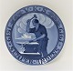 Royal 
Copenhagen. 
Mindeplatte 
#189. Odd 
Fellow platte. 
Smed der 
sammensmeder de 
tre ringe. 
1919. ...