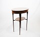 Small side table in polished mahogany from around the year 1890.
5000m2 showroom.
