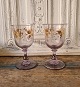 Beautiful 
French wedding 
glass, in glass 
with purple 
tone, decorated 
with leaves in 
gold. ...