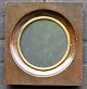 Antique wooden 
frame. Square. 
19th century. 
Round middle 
section with 
brass edge with 
...