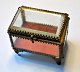 Jewelry box 
approx. 1900. 
France. With 
faceted glass 
and decorated 
brass frames 
and four legs. 
...