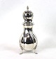 Sugar shaker on 
three feet of 
hallmarked 
silver.
22 x 8 cm.