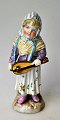 Antik 
håndbemalet 
porcelæns figur 
af pige med 
hurdy - gurdy, 
Elbogen, 19. 
årh. Tyskland. 
Med ...