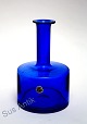 Kastrup 
glasværk, 
Flaskevase i 
lys koboltblå 
glas fra 1964. 
Højde 17 cm. 
Nederste 
diameter 11 ...