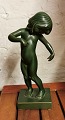 Grøn glaseret 
figur i keramik 
af Venus 
Kalipygos af 
Kai Nielsen for 
Peter Ipsens 
Enke. ...