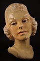 Decorative woman bust from the 40s in old painted papmache / plaster with fine 
old patina. Height: 32cm.