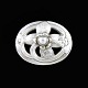 Georg Jensen 
Broche i 
Sterling Sølv 
#138
Tegnet af 
Georg Jensen 
1866 - 1935
Stemplet med 
...