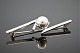 Hans Hansen 
smykke. 
Hans Hansen; 
Broche af 
sterling sølv. 
L. 6,2 cm. B. 
1,5 cm. 
Hans Hansen 
...