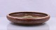 Royal 
Copenhagen. 
Bordfad i 
keramik, nr 
21824. Fadet 
changerer i 
brunlige 
farver. Fadet 
er ...