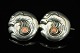Georg Jensen; An early silver brooch set with corals #14 (1911 - 1914)
