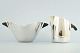 Evald Nielsen 
silver set. 
Einar Olsen 
for Evald 
Nielsen; A 
sugar bowl and 
creamer of 
sterling ...