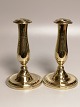 A pair of brass 
tulip poles