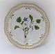 Royal Copenhagen. Flora Danica. Rundt serveringsfad
med gennembrudt kant. Model # 3527. Diameter 29 cm. (1 sortering). Viola canina 
Horn