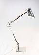 Bordlampe af rustfrit stål og af italiensk design, af Flos. Lampen er i flot brugt stand og vi ...