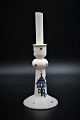 Royal Copenhagen "Jingle Bells" Christmas candlestick in porcelain with 
Christmas motif. 
Height: 18cm. from the year 1988.