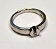 14 karat 
hvidguldsring 
med brillant, 
20. årh. 
Utydelig 
stemplet. 
Brillant: 1/32 
Carat. ...