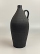 Stor flot 
brun-sort 
flaske-vase fra 
Dagnæs Keramik 
i midten af det 
20. århundrede. 
Vasen har et 
...