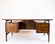 Skrivebordet i 
palisander, 
designet af 
Omann Junior i 
1960'erne, 
udgør et smukt 
og funktionelt 
...