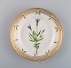 Royal Copenhagen Flora Danica salad plate in hand-painted porcelain with flowers 
and gold decoration. Model number 20/3573.
