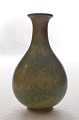 Vase fra 
1950'erne.
Glasur i gule, 
brune og 
himmelblå toner 
på stentøjs 
vase. 
Højde ca. 14,5 
...