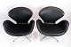 A pair of Swan 
chairs, model 
3320, designed 
by the 
legendary Arne 
Jacobsen in 
1958 and ...