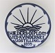 Königliches Kopenhagen. Mindeplatte Nr. 5. Ehrendiplom in der Frauenausstellung 
1895. Design Suzette Skovgaard. 13 Stück wurden produziert.