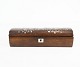 Small oblong 
shrine in 
rosewood 
decoreated with 
mother of 
pearls. The 
shrine is from 
the 1880s. ...