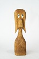 Figur med øjne 
i teak fra 
1970erne og i 
flot brugt 
stand.
Mål: H:19 cm.
