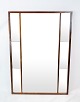 Spejl i 
palisander af 
dansk design 
fra 1960erne. 
Spejlet er i 
flot brugt 
stand.
105 x 74 cm.