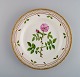 Royal Copenhagen Flora Danica dinner plate in hand-painted porcelain with 
flowers and gold decoration. Model number 20/3549.
