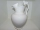 Bing & 
Grondahl, 
lidded 
chocolate 
pitcher with a 
lion on the 
handle.
This is from 
the period ...