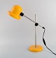 Svensk 
designer. 
Justerbar retro 
skrivebordslampe 
i gult lakeret 
metal og krom. 
1970'erne.  ...