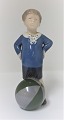 Royal Copenhagen. Porcelain figure. Boy with ball. Model 3542. Height 16 cm. (1 
quality)