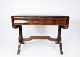 Antikt 
skrivebord af 
mahogni med 
skuffe og 
klapper fra 
1860. Bordet er 
i flot stand.
H - 74 cm, ...