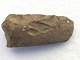 Stenøkse. 
Danmarks 
oldtid. Mål ca. 
10,5x4,5 cm
