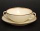 Kjøbenhavns 
Porcellains 
Maleri, Vallø 
cremefarvet 
glasur med 
guldbelægning. 
Fremstillet fra 
...