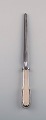 Rare Evald 
Nielsen number 
14 sharpening 
steel in 
hammered silver 
(830) and 
stainless 
steel. ...