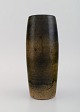 Ole Bjørn Krüger (1922-2007), Danish sculptor and ceramicist. Unique vase in 
glazed stoneware. Beautiful glaze in green-brown shades. 1960s / 70s.
