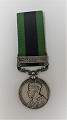 Indien Medalje 
1908-1935, 
Waziristan 
1919-21. 
Indgraveret i 
kanten 28 SOWAR 
KHAZAN SINGH - 
21 CAVY.