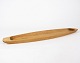 Serveringsfad i 
eg i dansk 
design af 
Skjøde Skjern.
H - 3 cm, B - 
70 cm og D - 17 
cm.