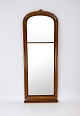 Tall mirror of mahogany from around the 1860s. 
5000m2 showroom.