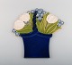 Margareta 
Hennix (b. 
1941) for 
Gustavsberg. 
Large wall 
plaque in 
glazed 
ceramics. 
Flower ...