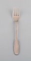 Evald Nielsen 
number 14 lunch 
fork in 
hammered silver 
(830). 1920s. 3 
pcs in stock.
Length: ...